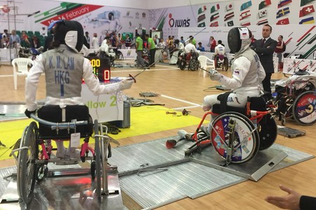 Lam Ka-man (left, wheelchair fencing)